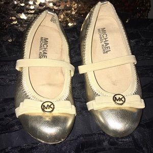Gold ballet flats MK